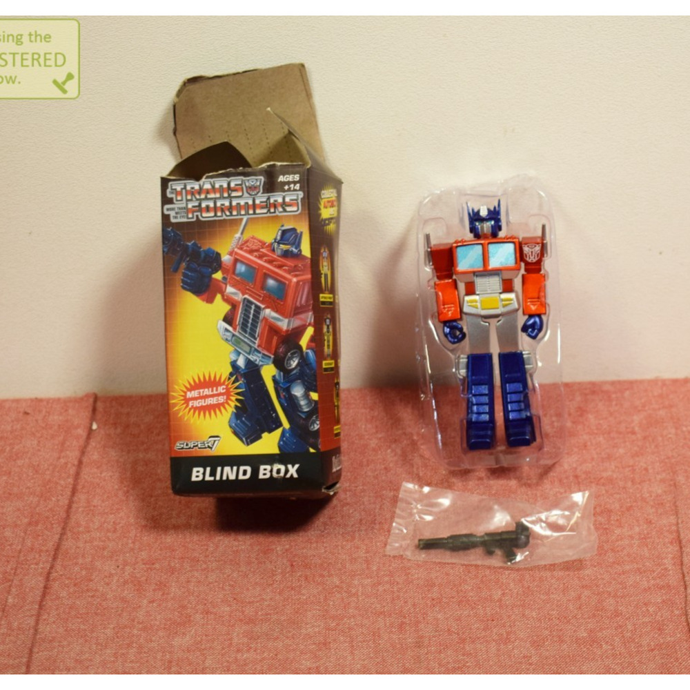 Super7 Transformers Surprise Box Action Figure Metallic Optimus Prime